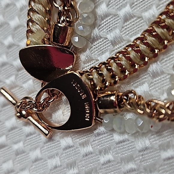 HENRI BENDEL 3 STRAND CRYSTAL CHARM BRACLET/TOGGLE CLOUSURE IN WHITE &GOLD - Picture 5 of 8